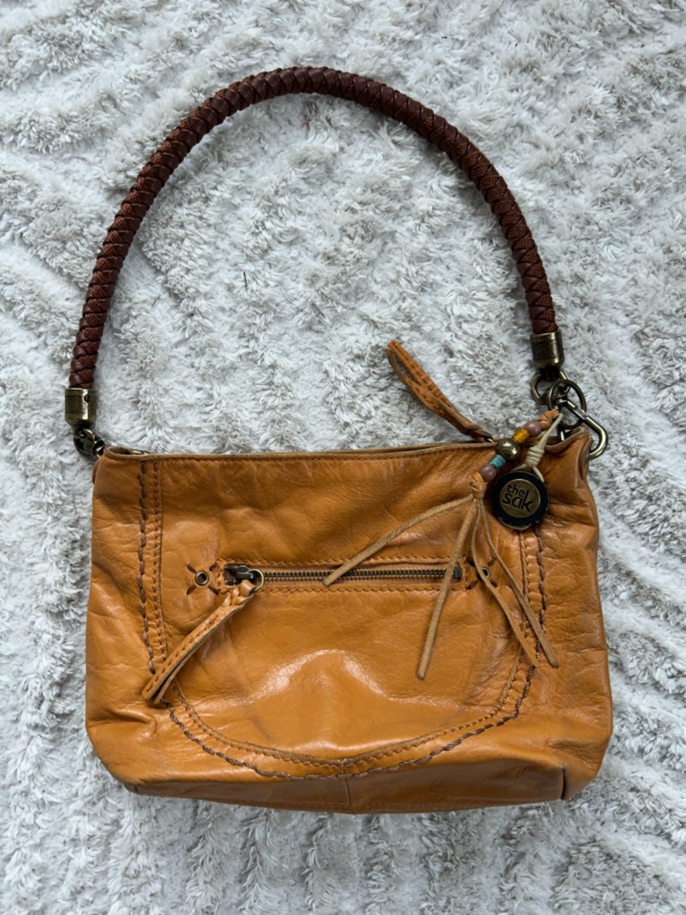 The Sak Bohemian Chic Bag with Braided Handle and Tassel